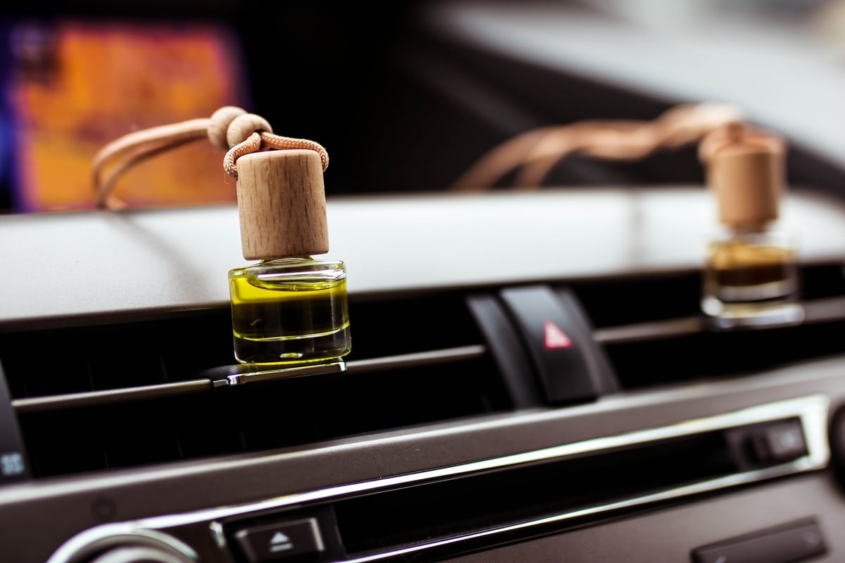 Car air perfume freshener bottles inside the car